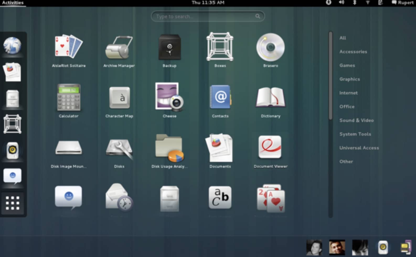 Captura de pantalla de la vista de actividades de GNOME mostrando una cuadrícula de iconos de aplicaciones, una barra de búsqueda y un menú lateral con categorías de aplicaciones.